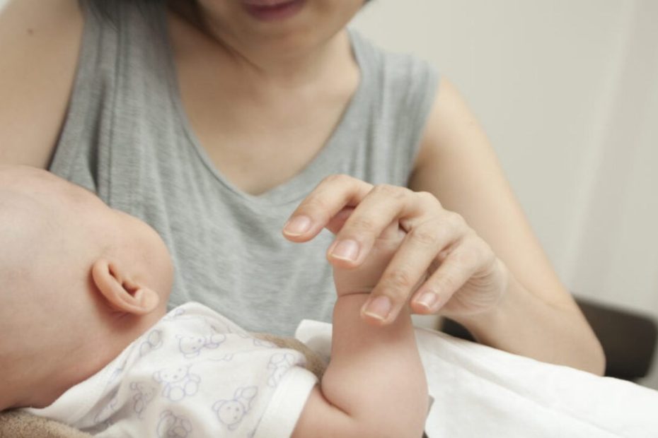 Volunteer With Babies in the Hospital with Cuddling
